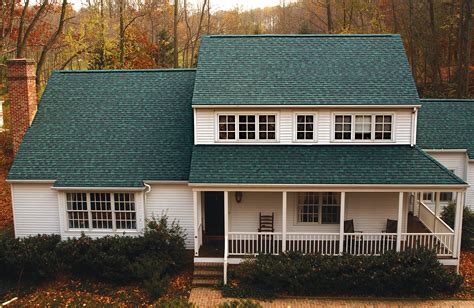 white metal roof with green exterior house paint colors|hunter green roof color scheme.